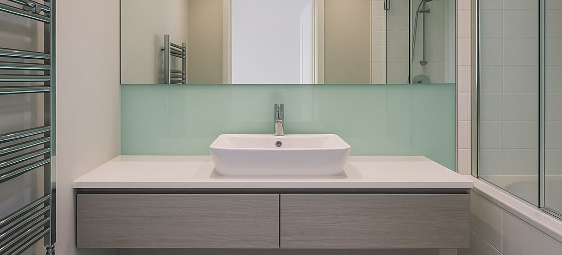 Revamping bathrooms with modern glass elegance
