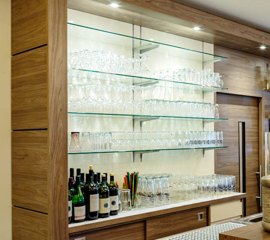 Custom glass shelving supplied & installed by professional glaziers.